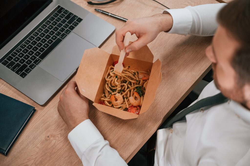 eating at desk from ACI