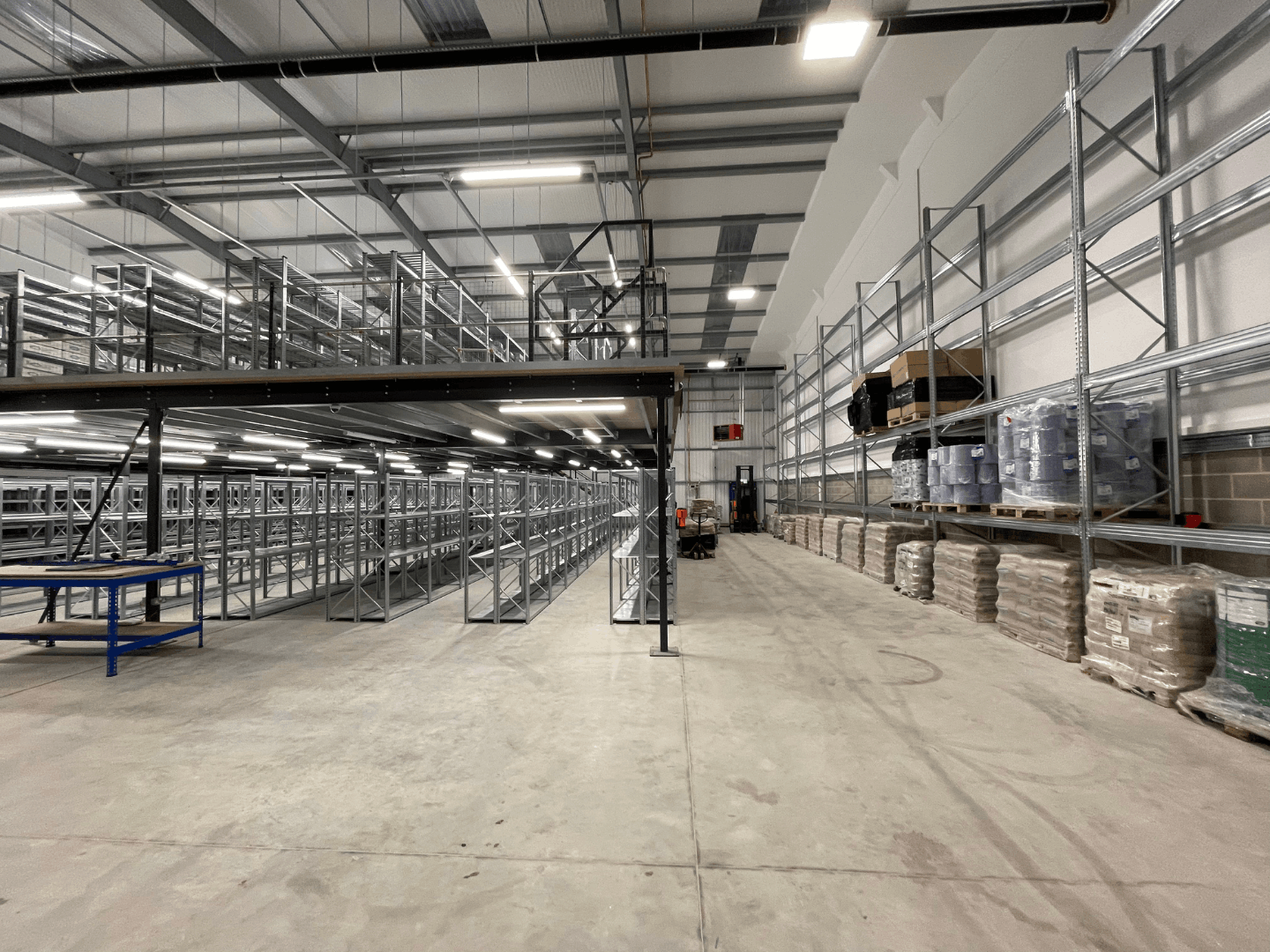 Completed warehouse storage area with mezzanine shelving and pallet racking for Cromwell Tools