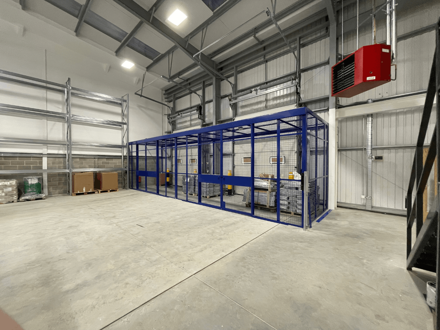 Secure mesh partitioning with sliding access doors at Cromwell Tools Bristol Hub facility