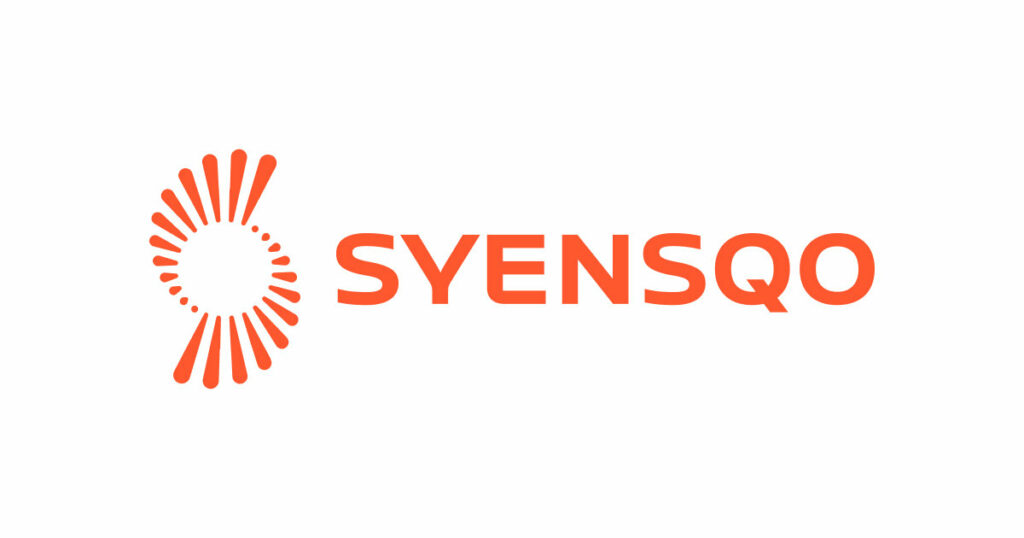 The Syensqo logo displayed on a clean white background, featuring an orange abstract circular emblem made up of curved lines, dots, and elongated shapes to the left, followed by the word “SYENSQO” in bold uppercase orange lettering.